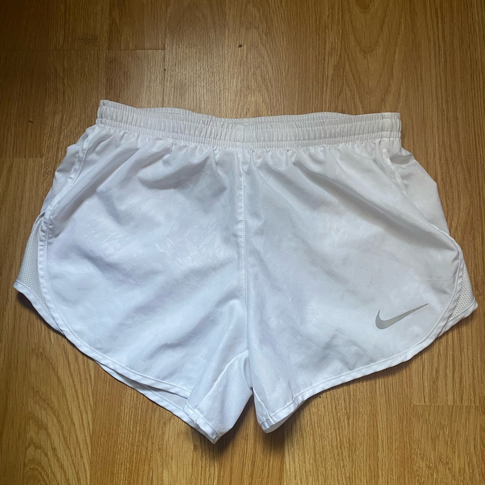 White Nike Running shorts.